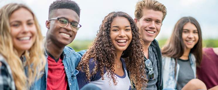 group of teens smiling